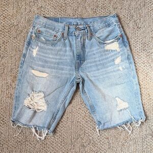 Levi's 511 Blue Denim Jean Shorts with Classic Stitching and Raw Hem